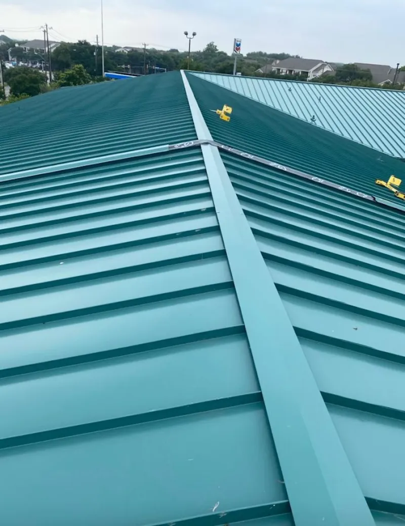 Green commercial metal roof ridge and valley for Metal Roof Repair in Freeport
